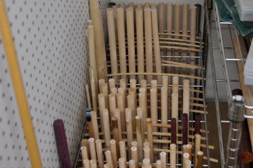Here is a rack of shaft wood in various stages of cutting and seasoning
