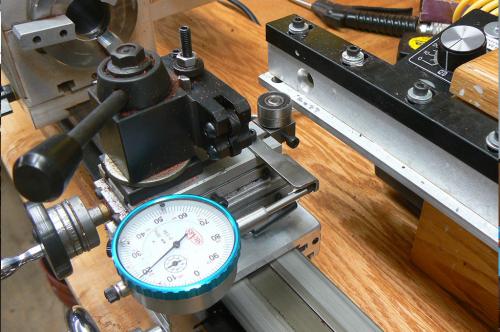 A dial indicator attached to our lathe for exact work